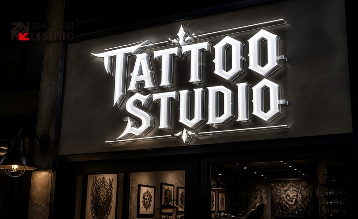 Tattoo studio sign with bold cool light and dark metallic finish expressing attitude and artistic identity